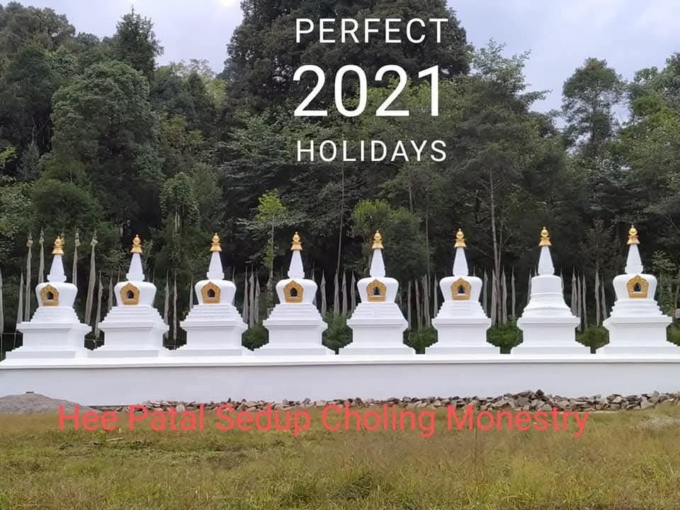 Row of white Buddhist stupas