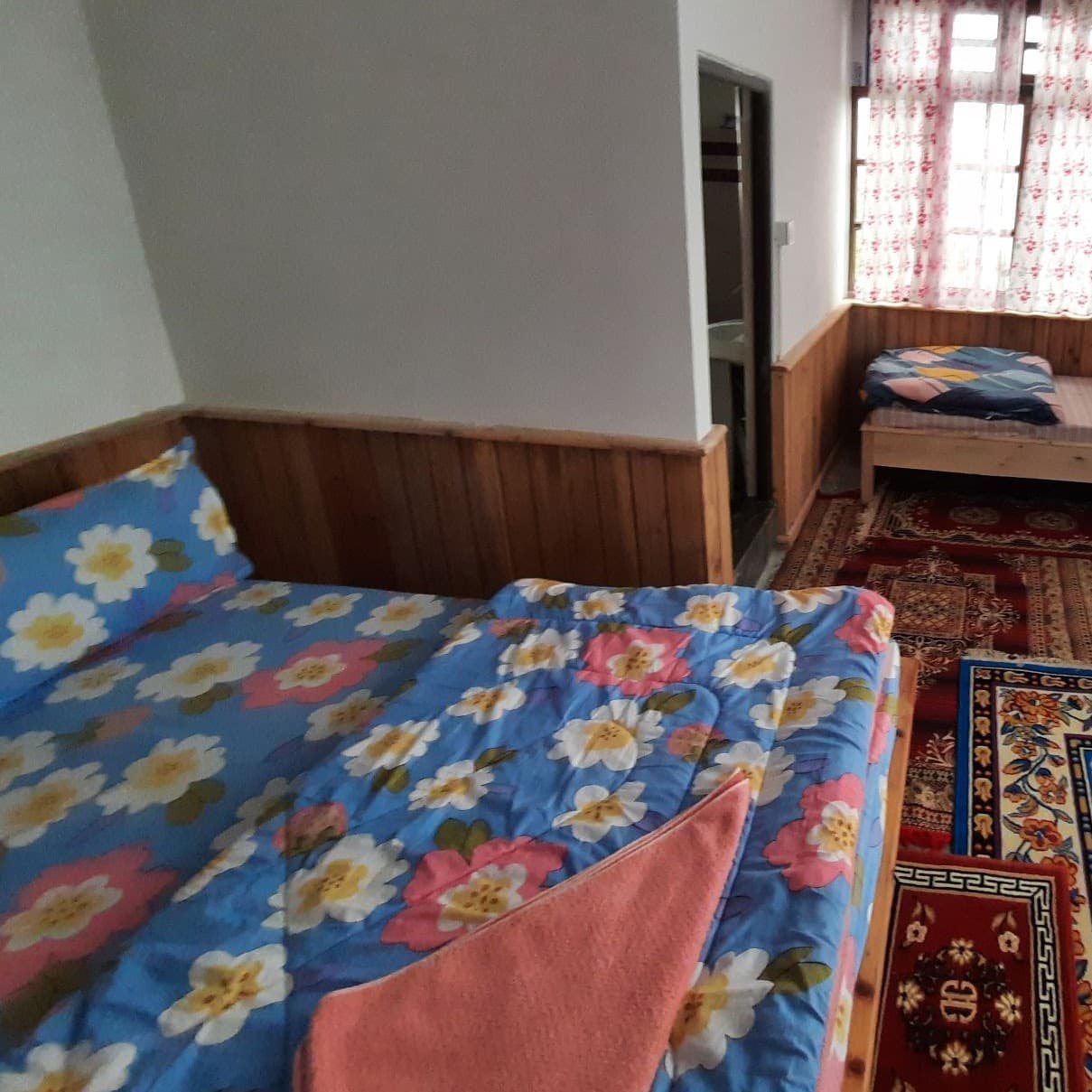 Room One — Alternate bed view